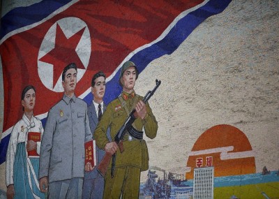 PYONGYANG, NORTH KOREA - APRIL 02:  Propaganda mural painting is seen outside People(degrees)?s Palace of Culture on April 2, 2011 in Pyongyang, North Korea. Pyongyang is the capital city of North Korea and the population is about 2,500,000.  (Photo by Feng Li/Getty Images)